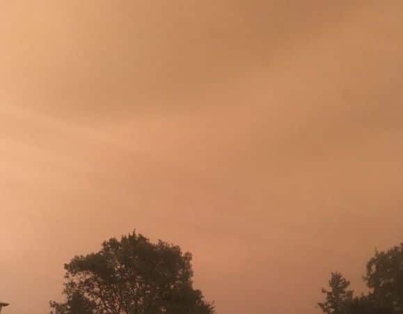 Picture of smoke filled reddish sky.