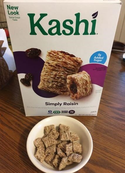 Picture of Kashi Simply Raisin Cereal box with some of the cereal in a bowl.
