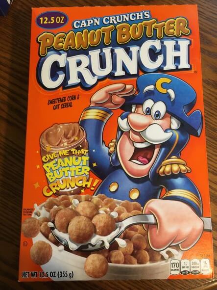 Picture of a Capn Crunch Peanut Butter Crunch cereal box.