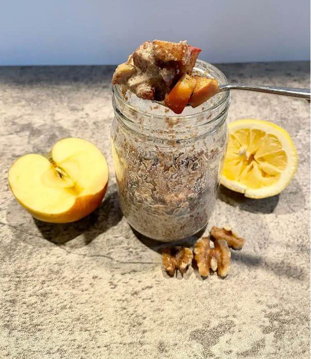 picture of flaxseed pudding with apples and walnuts in a glass jar. Photo Credit: Sheri Berger, RDN CDCES
