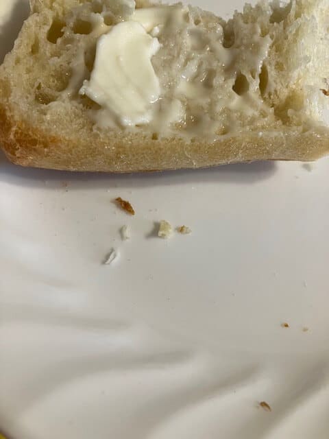 picture of bread with some melted vegan babybel cheese
