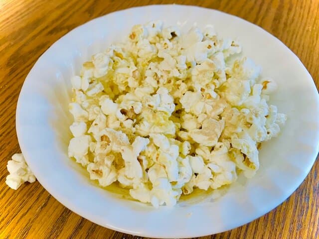 vegan popcorn in a bowl on a wood table